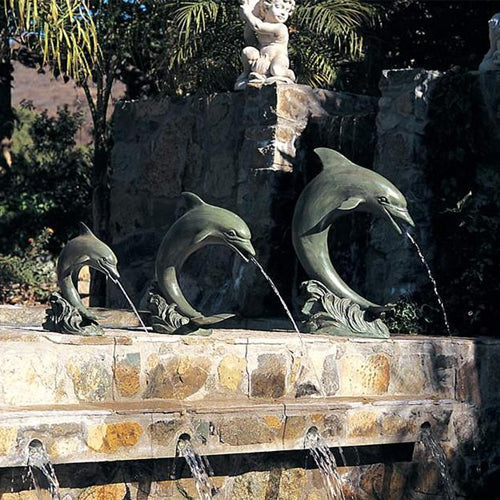 Large single dolphin garden and pool accent made of brass by Brass Baron.